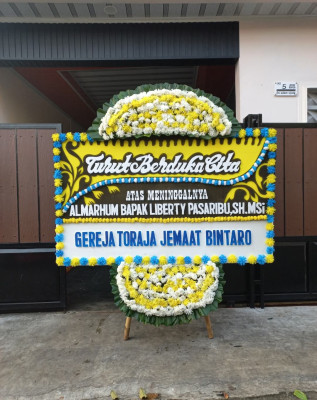 Papan Bunga Duka di Pekayonjaya